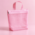Trousse en maille rose