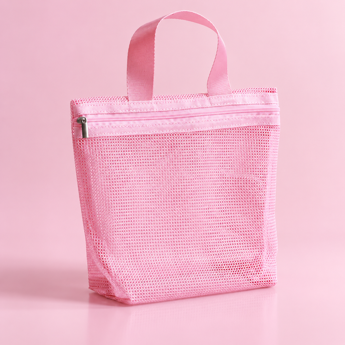 Trousse en maille rose